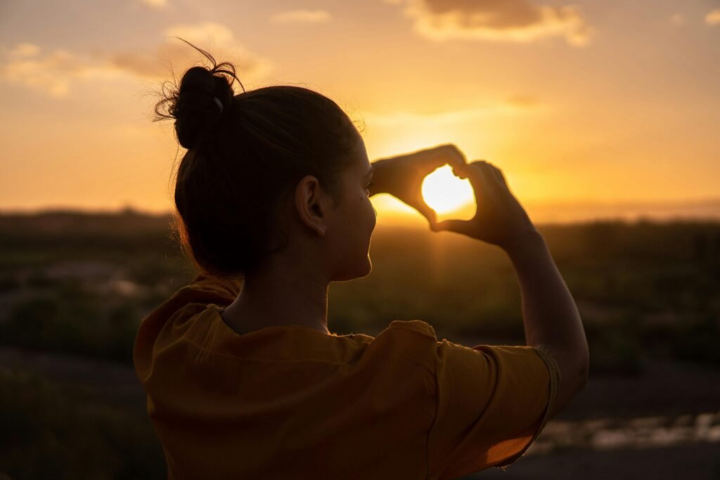 A woman outdoors, promoting self-care and holistic well-being for health and balance